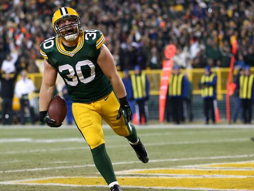 John Kuhn: Celebrates one of his two touchdowns