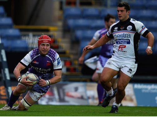 Michael Hills scores a try for the Exiles