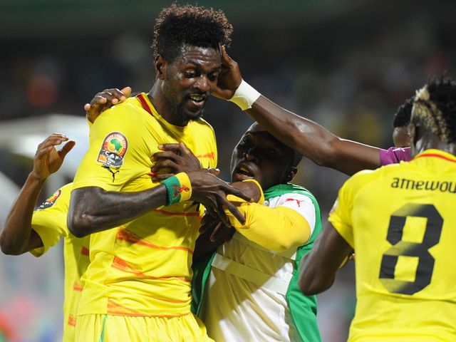 Adebayor celebrates his opening goal