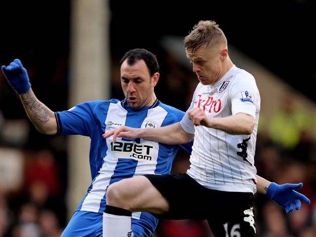 Ramis (l) and Duff compete for possession
