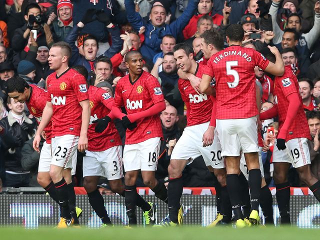 Van Persie is congratulated after opening the scoring