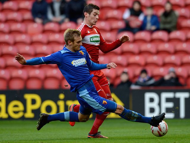 Joel Ekstrand tackles Lukas Jutiewicz