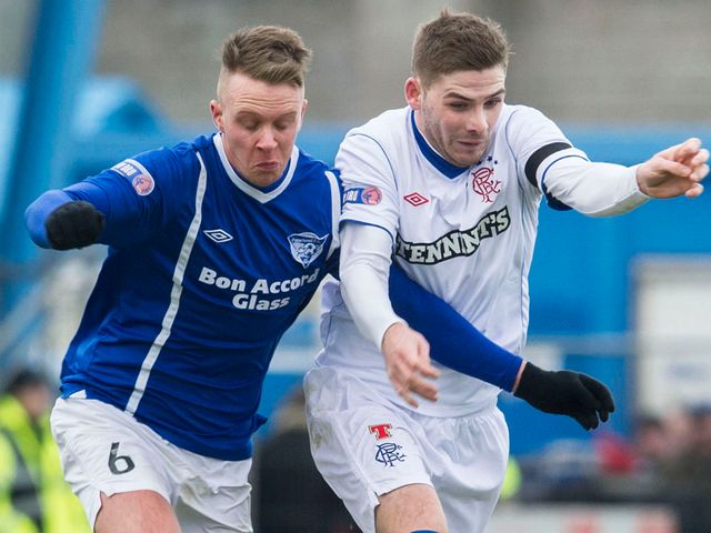 Ryan Strachan competes with Kyle Hutton