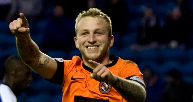 Johnny Russell: Celebrates his hat-trick at Kilmarnock