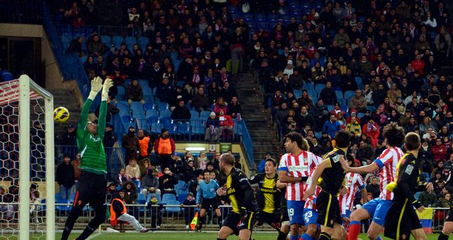 Tiago heads Atletico into the lead