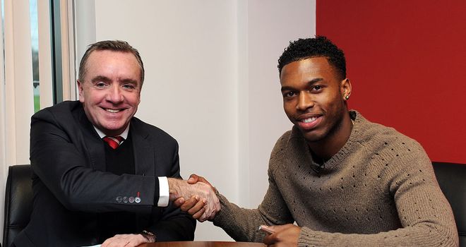 Deal done: Ian Ayre and Daniel Sturridge shake on it