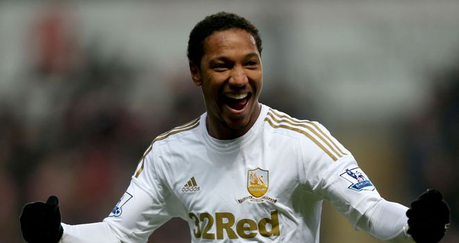 Jonathan de Guzman: Keen to remain at Swansea to enhance his chances of playing in the World Cup