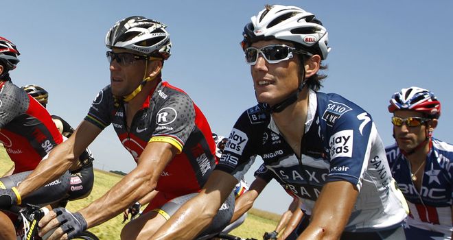 Andy Schleck (right) is not sure whether Lance Armstrong (left) will confess to doping.