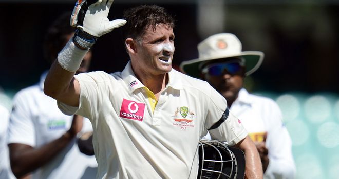 Mike Hussey waves to the crowd as he exits the Test arena for the final time