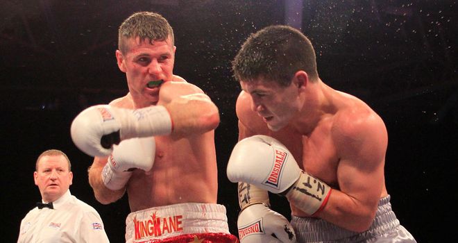 Eamonn O'Kane lets a left hand go against John Ryder (Pic Lawrence Lustig)