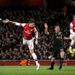 Olivier Giroud heads home to pull a goal back for the Gunners...