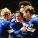 Baines is mobbed by his delighted Everton team-mates