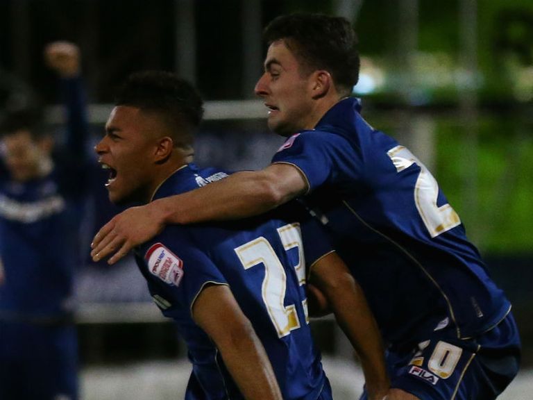 Wabara (left) has joined Blackpool on loan until the end of the season