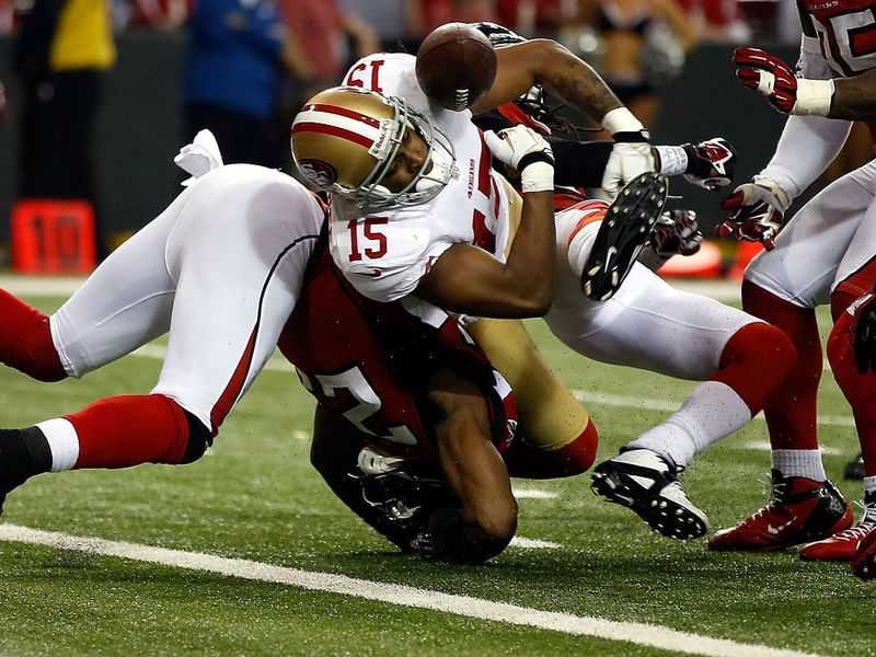 Michael Crabtree fumbles right on the Falcons goalline