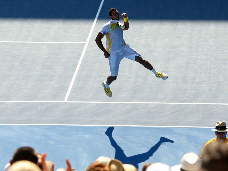 Jo-Wilfried Tsonga celebrates his win...
