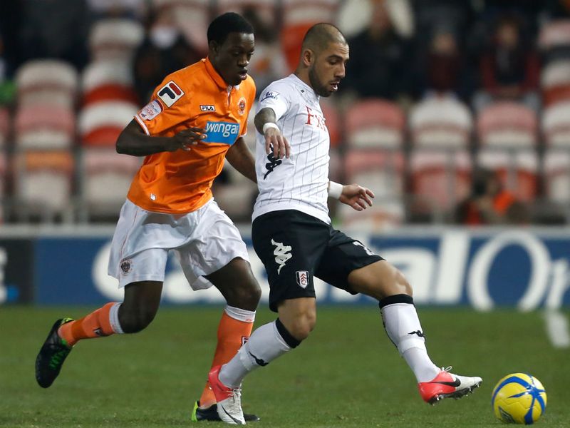 Askan Dejegah competes with Isaiah Osbourne at a freezing Bloomfield Road on the coast
