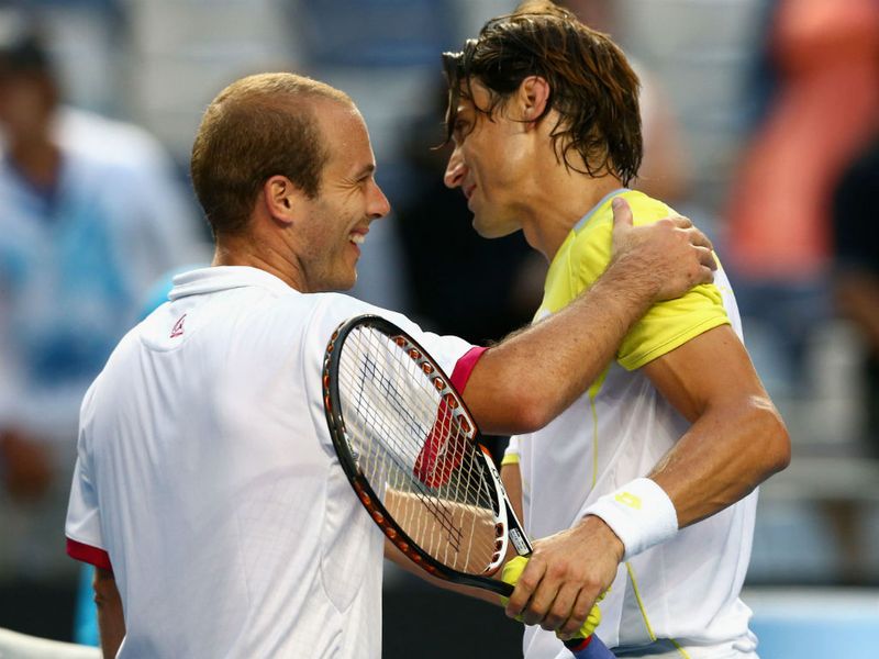 Number four seed David Ferrer safely progressed with a straight sets win over Belgium's Olivier Rochus.