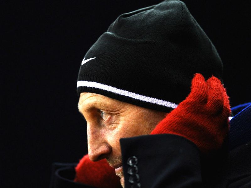 Palace boss Ian Holloway watches the action on a cold night in Staffordshire