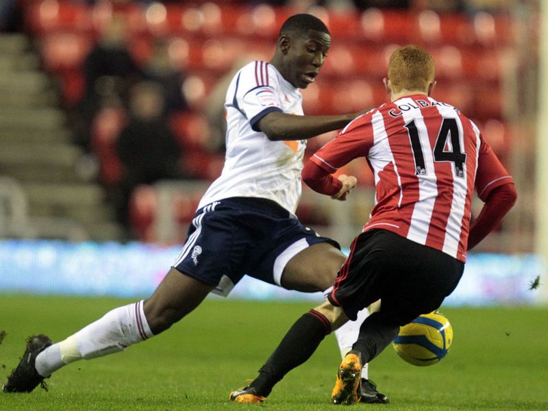 Midfielder Jack Colback vies for the ball with Benik Afobe at the Stadium of Light