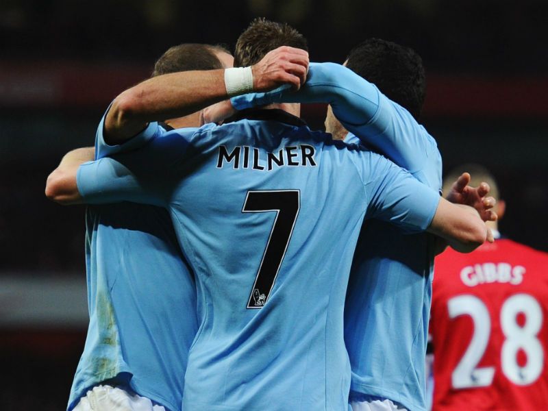 City opener: James Milner celebrates putting Manchester City ahead soon afterwards