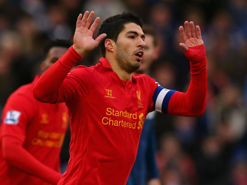 Captain fantastic: Liverpool skipper Luis Suarez replies for his side