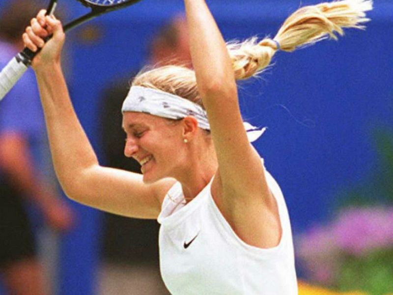 Mary Pierce: Celebrates her 1995 victory over Arantxa Sanchez Vicario