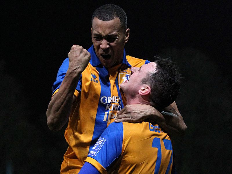 Matt Green grabs a goal back for Mansfield Town but it is too little too late.