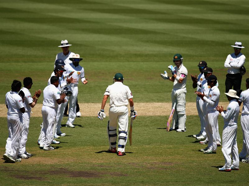 Michael Hussey was given a guard of honour as he came out to bat in his final Test...