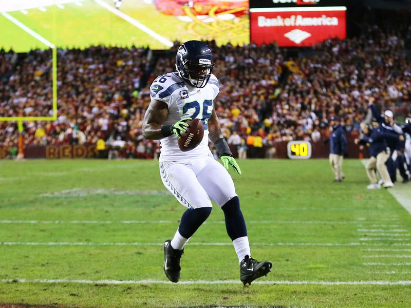 Michael Robinson goes in from four yards out after being found by Russell Wilson for the Seahawks' first touchdown of the contest.