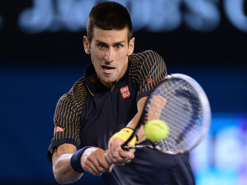 Pushing on: Djokovic asserts in the third set, securing the first break of the match in the eighth game