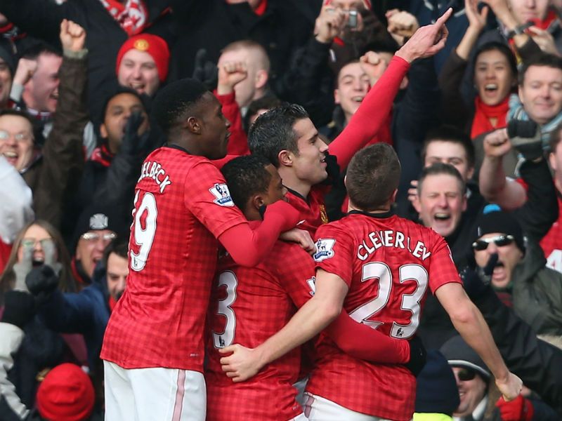 Goal joy: Robin van Persie celebrates scoring Manchester United's opener against Liverpool...