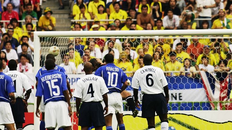 Ronaldinho's free-kick drops into the England net at the 2002 World Cup