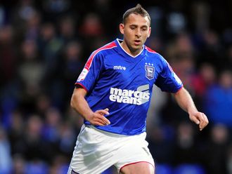 Ipswich: Will bear owners' name on shirt for another year