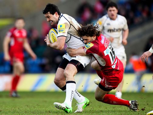 Cameron Shepherd of Sale is tackled by Tom Arscott