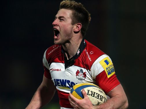 Henry Trinder celebrates his Gloucester try