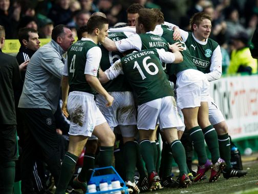 Hibernian celebrate what proved to be the winning goal