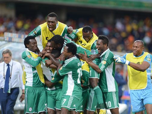 Emmanuel Emenike's goal finds him mobbed by his team-mates