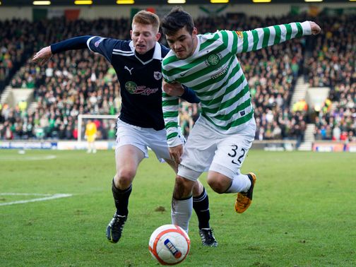 Tony Watt tries to get the better of Jason Thomson.