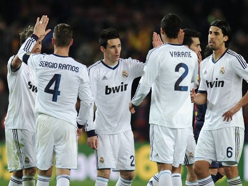 Real Madrid celebrate during their victory at Barcelona