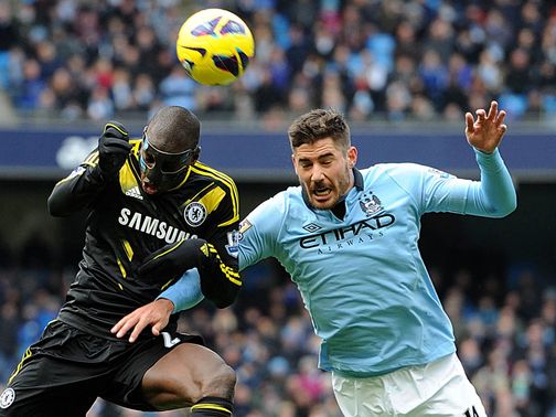 Demba Ba battles with Javi Garcia