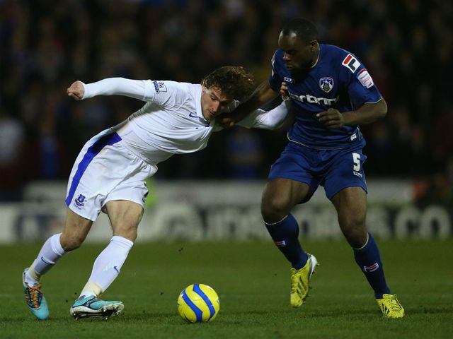 Nikica Jelavic looks to keep possession.