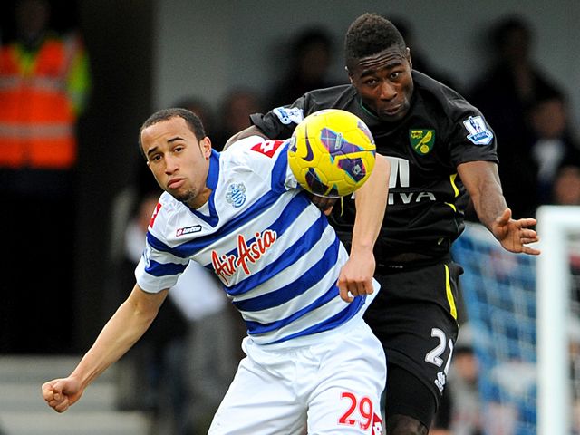 Townsend and Tettey go up for a header.