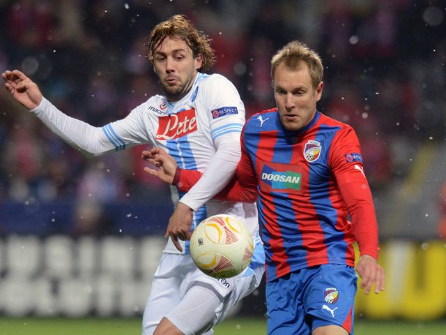 Napoli's Marco Donadel and Daniel Kolar battle for possession