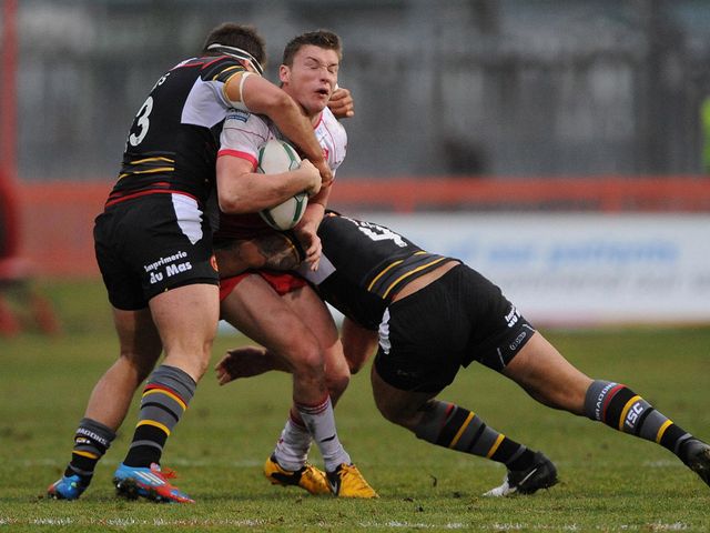 Gregory Mounis is tackled