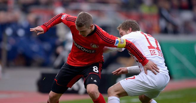 Lars Bender and Marcel de Jong battle for possession