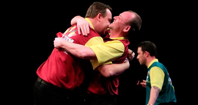 Belgium's Huybrecht brothers celebrate after knocking Australia out