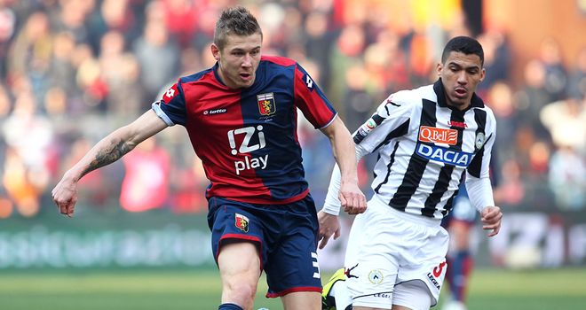 Juraj Kucka takes the ball past Marques Loureiro Allan