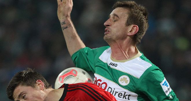 Jens Hegeler competes with Milorad Pekovic