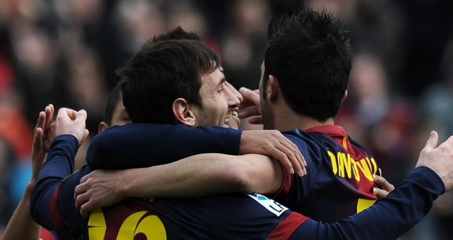 Lionel Messi celebrates his latest Barcelona goal