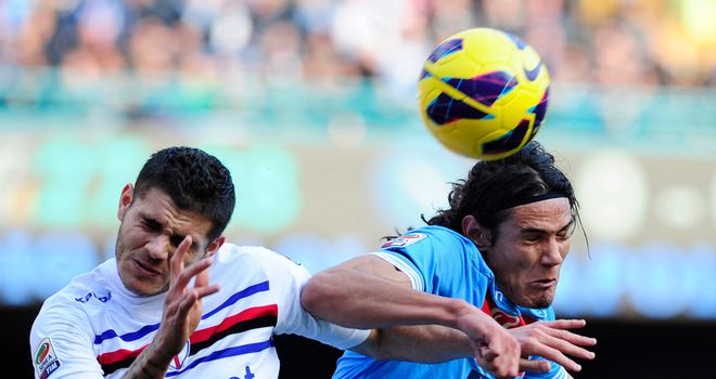 Edinson Cavani wins a header for Napoli